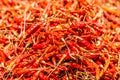 Hot and spicy Red Chilli ,Dried red chili,Pepper,Chillies as background for sale in a local food market,thai food ,close up,textur Royalty Free Stock Photo
