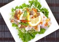 Hot and spicy steamed fish in lemon sauce Royalty Free Stock Photo