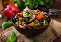 Hot spicy stew eggplant, sweet pepper, olives and capers. Royalty Free Stock Photo