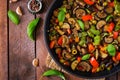 Hot spicy stew eggplant, sweet pepper, olives and capers Royalty Free Stock Photo