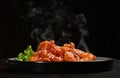 Hot and spicy sweet and sour prawns shrimp salad leaf and steam smoke Royalty Free Stock Photo