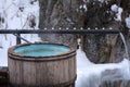 Hot springs georhemal water in mountains in winter. Vat with hot geothermal water in Medeo gorge, Gorelnik hot springs