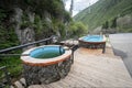 Hot springs geothermal water in mountains. Vat with hot geothermal water in Medeo gorge, Gorelnik hot spring , Almaty, Kazakhstan