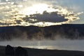 Steam and clouds over the hot springs