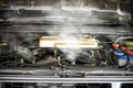 Hot steam coming out of Radiator, Car engine over heat Royalty Free Stock Photo