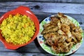 hot steamed long grain yellow Basmati rice with vegetables peas and carrots with sliced onion and grilled chicken breast pieces Royalty Free Stock Photo