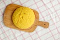 Hot steaming polenta on a old wooden board