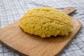 Hot steaming polenta on a old wooden board