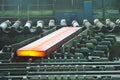 Hot steel on conveyor Royalty Free Stock Photo