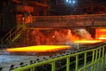 Hot steel on conveyor Royalty Free Stock Photo