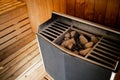 Hot stone heater machine in sauna spa room Royalty Free Stock Photo