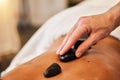 Hot stone massage, spa and skincare for wellness, health and physical therapy to relax in luxury. Mind, body and spirit Royalty Free Stock Photo