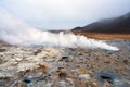 Hot sulfuric steam vent spewing sulphur steam in the hot sulfuric and geothermal area of Namaskard in Myvatn/Iceland.