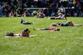 On a hot summer day, people sunbathe in a park in the city center, New York, USA Royalty Free Stock Photo