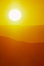 Hot Summer Sunrise with Large Sun and Bright Yellow Sky Royalty Free Stock Photo