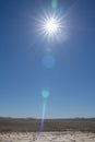 Hot sun over Namibia landscape with dry cracked soil Royalty Free Stock Photo