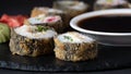 Hot Sushi Roll with salmon, eel, tuna, avocado, royal prawn, cream cheese Philadelphia, caviar tobica, chuka
