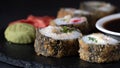 Hot Sushi Roll with salmon, eel, tuna, avocado, royal prawn, cream cheese Philadelphia, caviar tobica, chuka