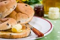 Hot tea cakes with melted butter, jam and honey Royalty Free Stock Photo