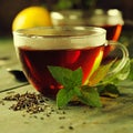 Hot tea cup with mint and sugar Royalty Free Stock Photo