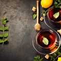 Hot tea cups with mint, lemon and sugar