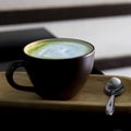 Hot tea in mug and spoon. Royalty Free Stock Photo