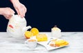 Hot tea with a mug spoon oops orange slices and sugar. Cozy home tea concept Royalty Free Stock Photo