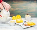 Hot tea with a mug spoon oops orange slices and sugar. Cozy home tea concept Royalty Free Stock Photo