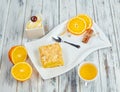 Hot tea with a mug spoon oops orange slices and sugar. Cozy home tea concept Royalty Free Stock Photo