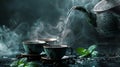 Hot tea is pouring from a teapot into cup with magical morning background Royalty Free Stock Photo