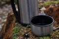 Hot tea in thermos for a walk in the woods Royalty Free Stock Photo