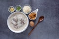 Hot Thai congee (rice porridge) with minced pork ball and boiled egg as breakfast Royalty Free Stock Photo