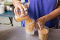 Hot Thai tea milk brewing mixed signature local beverage Royalty Free Stock Photo