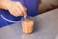 Hot Thai tea milk brewing mixed signature local beverage Royalty Free Stock Photo