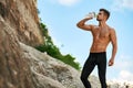 Hot Thirsty Man Drinking Water Drink After Running Outdoors. Sport Royalty Free Stock Photo