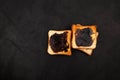 Hot toasted bread for breakfast. Roasted Aussie savory toasts with vegemite spread. Vegemite is a very popular yeast based spread