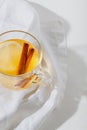 Hot Toddy cocktail drinks with lemon, honey and cinnamon stick in glass on white background Royalty Free Stock Photo