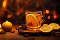 Hot toddy - hot whiskey with lemon, honey and spices. Against the background of glare.