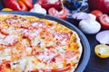 Hot true pepperoni italian pizza with salami and cheese Royalty Free Stock Photo