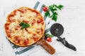 Hot true PEPPERONI ITALIAN PIZZA with salami and cheese. TOP VIEW Tasty traditional pepperoni pizza on board on white wooden table Royalty Free Stock Photo