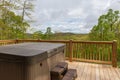 A hot tub on the deck to soak in after a day of hiking.