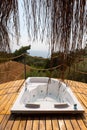 Hot tub in the hotel room suite balcony with sea view. Summer day honeymoon romantic luxury resort vacation place Royalty Free Stock Photo