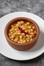 Hot turkish bean stew on dark background.
