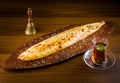 Hot Turkish Pide Pockets are ready to eat with Turkish tea Royalty Free Stock Photo