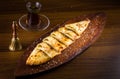 Hot Turkish Pide Pockets are ready to eat with Turkish tea Royalty Free Stock Photo