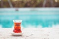 Hot turkish tea outdoors near water. Turkish tea and traditional Royalty Free Stock Photo