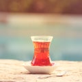 Hot turkish tea outdoors near water. Turkish tea and traditional Royalty Free Stock Photo