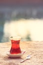 Hot turkish tea outdoors near water. Turkish tea and traditional Royalty Free Stock Photo