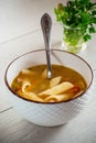 hot vegetable soup with large pasta in a bowl