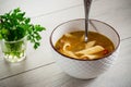 hot vegetable soup with large pasta in a bowl